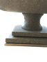 Centro de mesa cinza com detalhe em inox